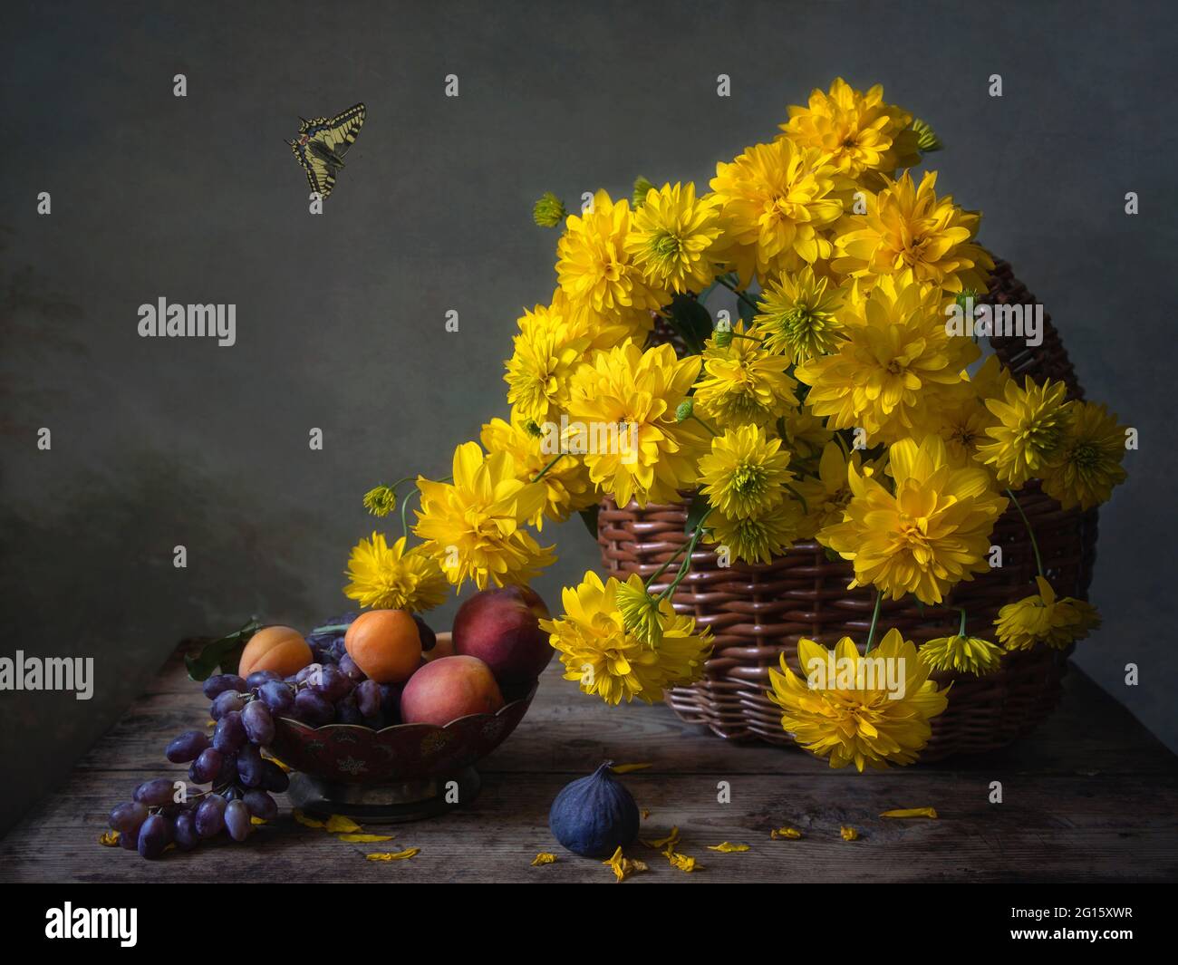 Still life with beautiful bouquet of flowers and fruits Stock Photo - Alamy
