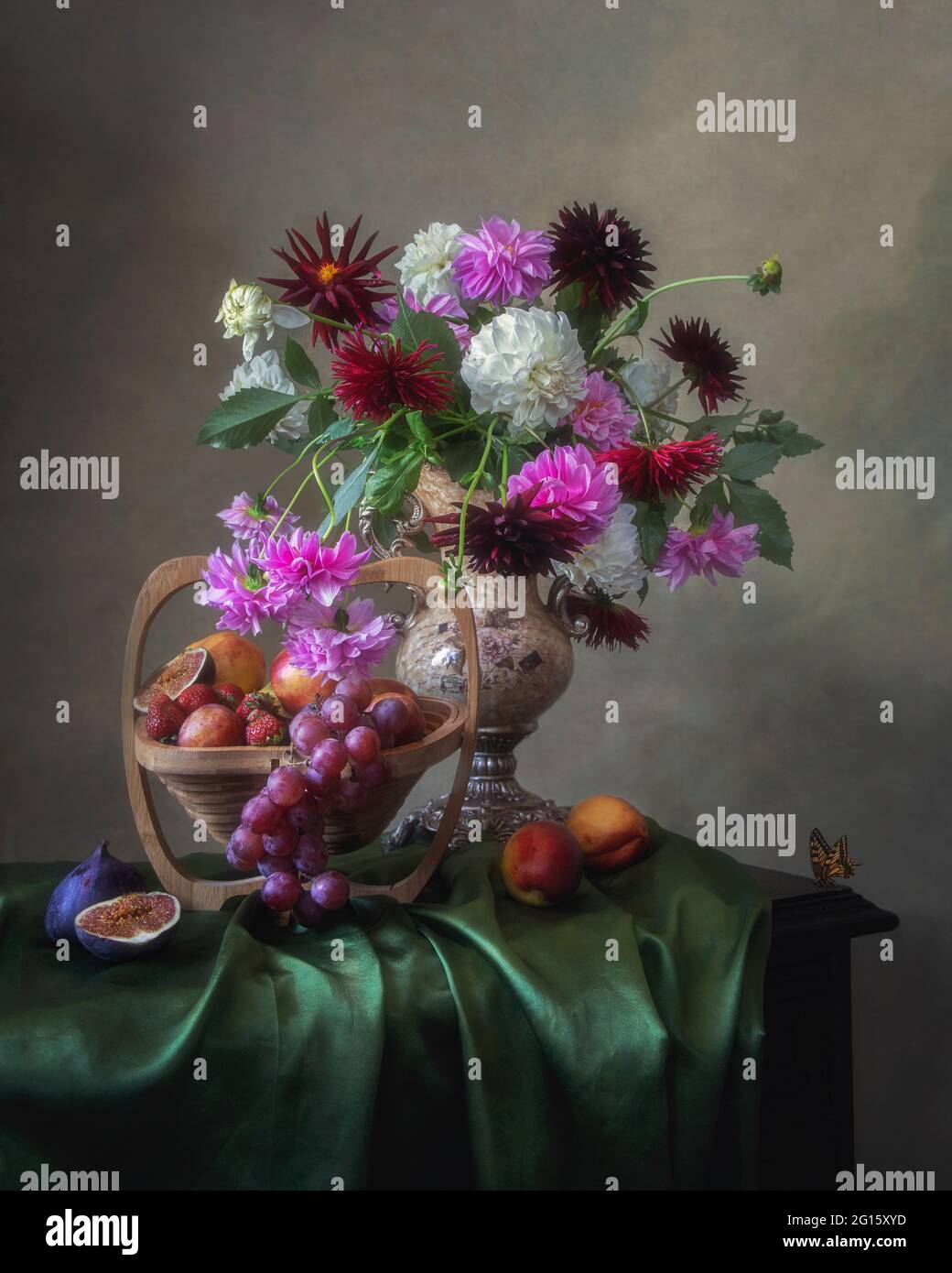 Still life with beautiful bouquet of flowers and fruits Stock Photo - Alamy