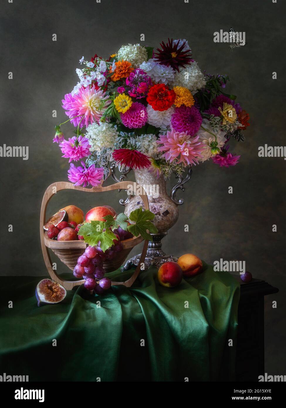 Still life with beautiful bouquet of flowers and fruits Stock Photo - Alamy