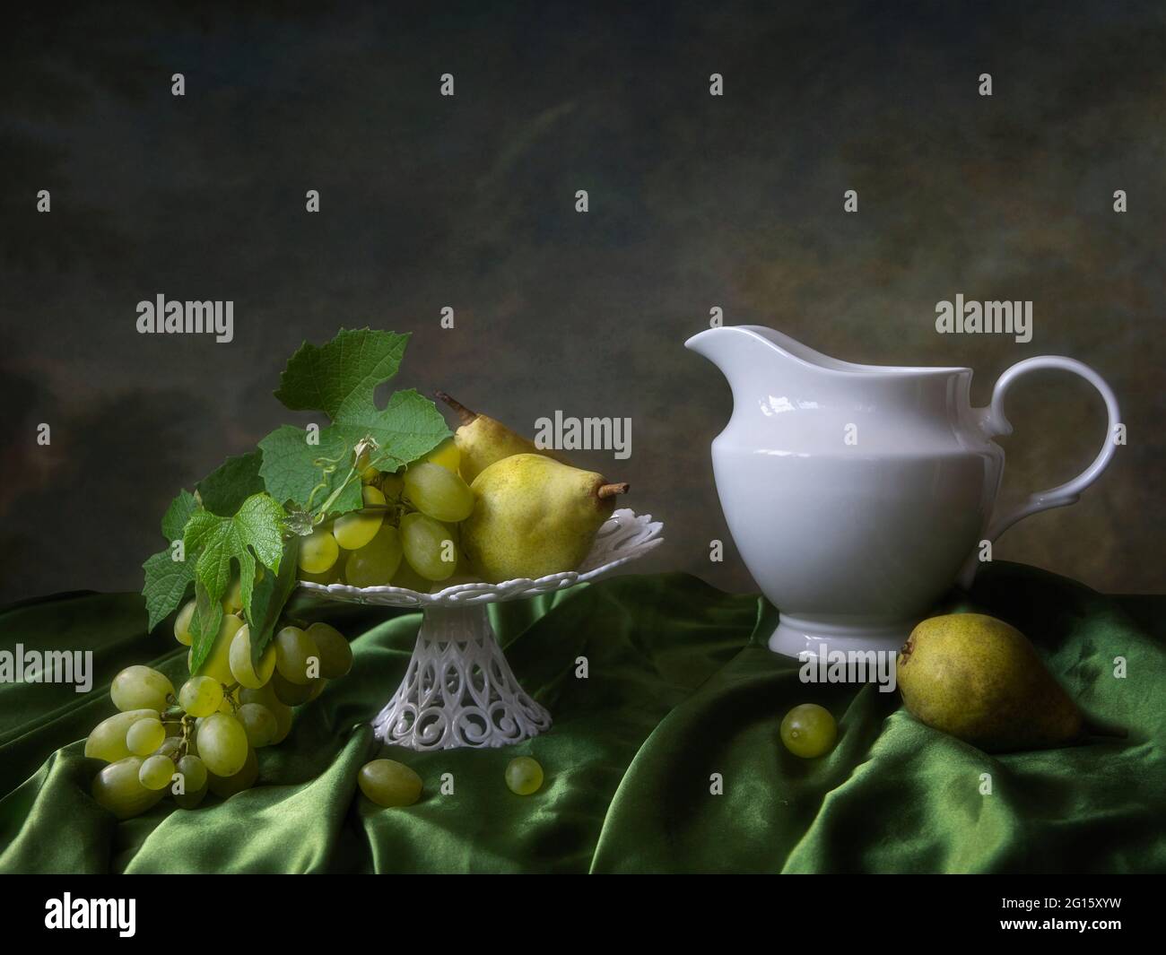 Still life with fruits and white jug Stock Photo