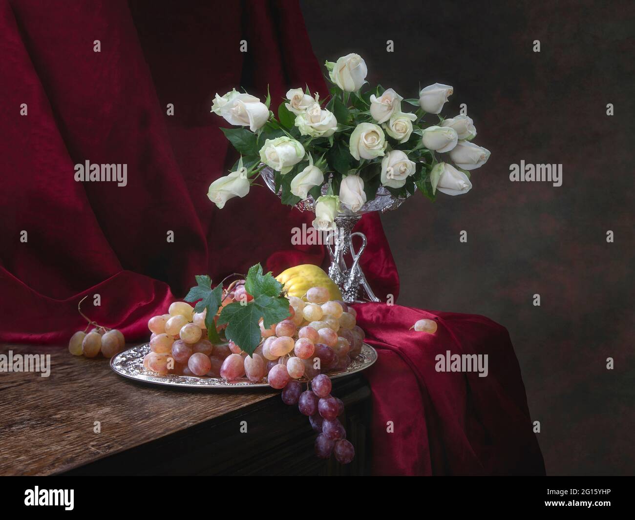 Still life with beautiful bouquet of flowers and fruits Stock Photo - Alamy