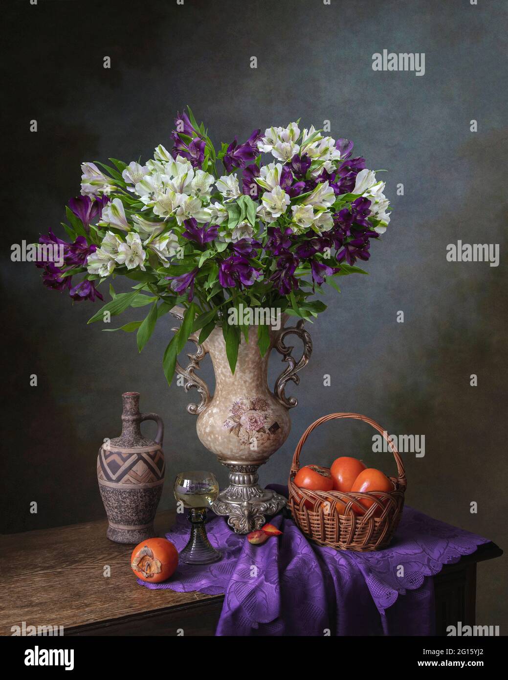 Still life with bouquet of flowers and fruits Stock Photo - Alamy