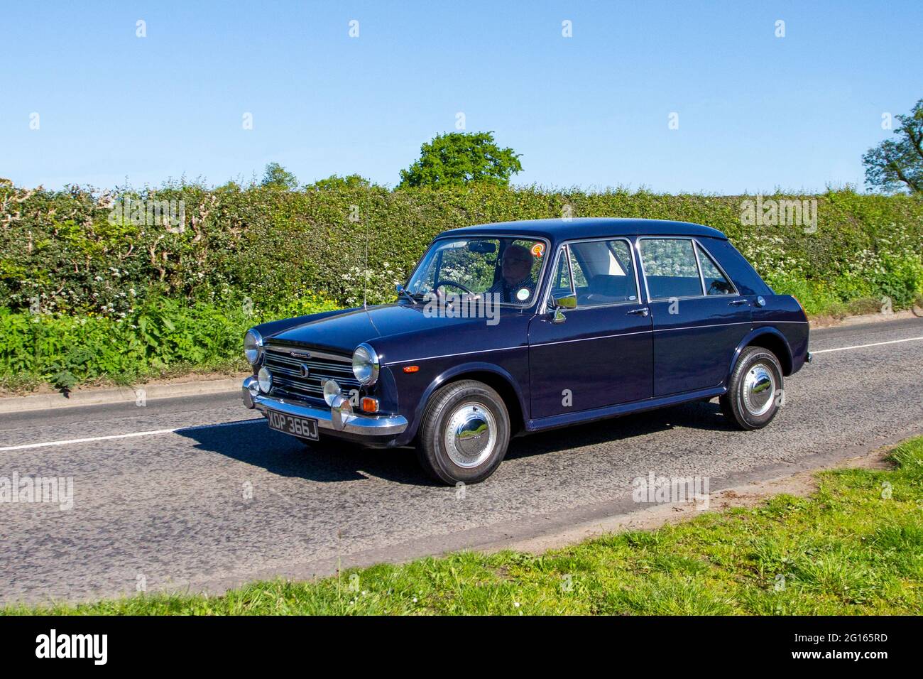 1971 70s seventies blue Austin 1100 petrol 1098cc car en-route to Capesthorne Hall car show in Cheshire, UK Stock Photo