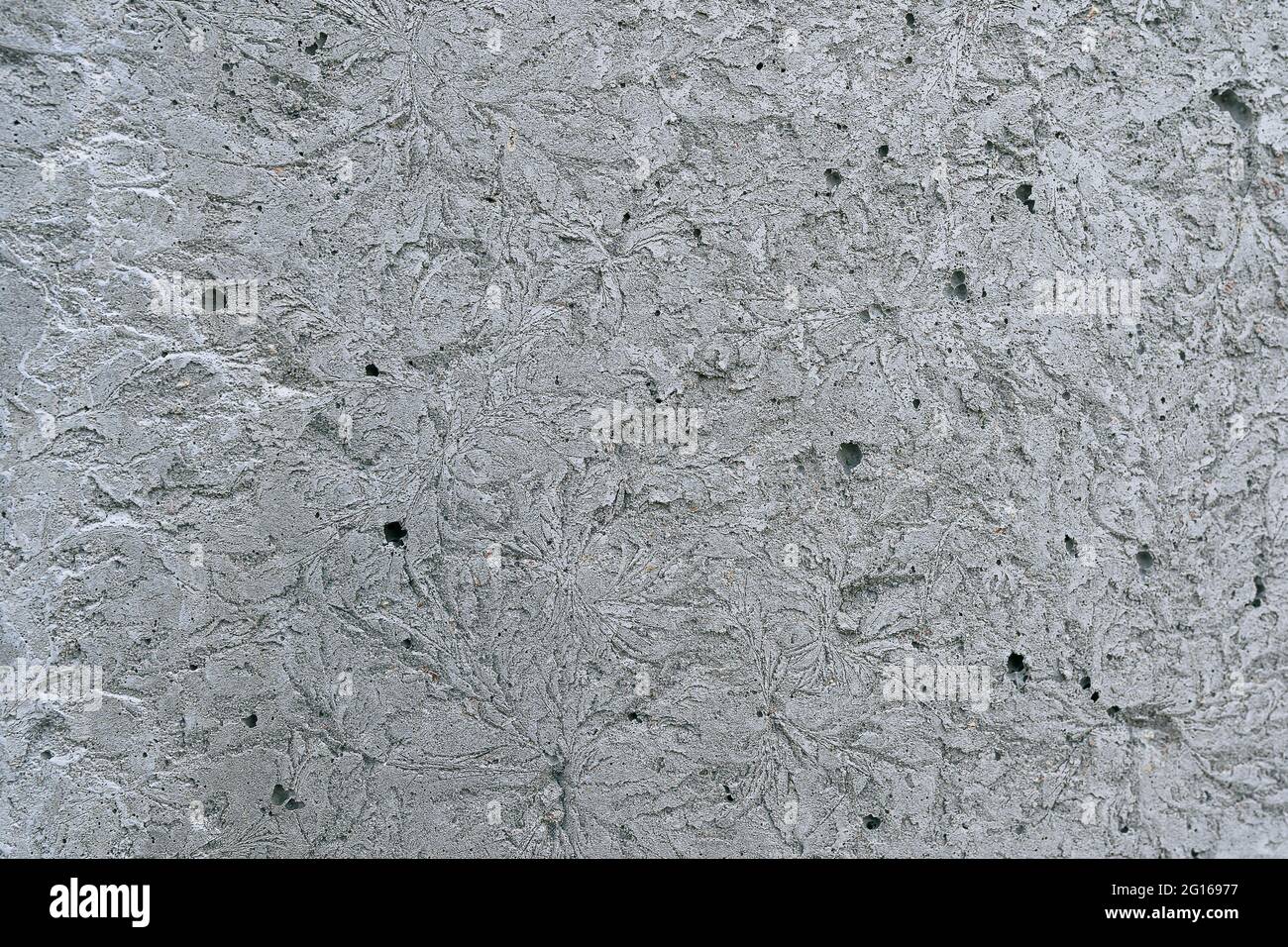 gray concrete wall with abstract cracks Stock Photo