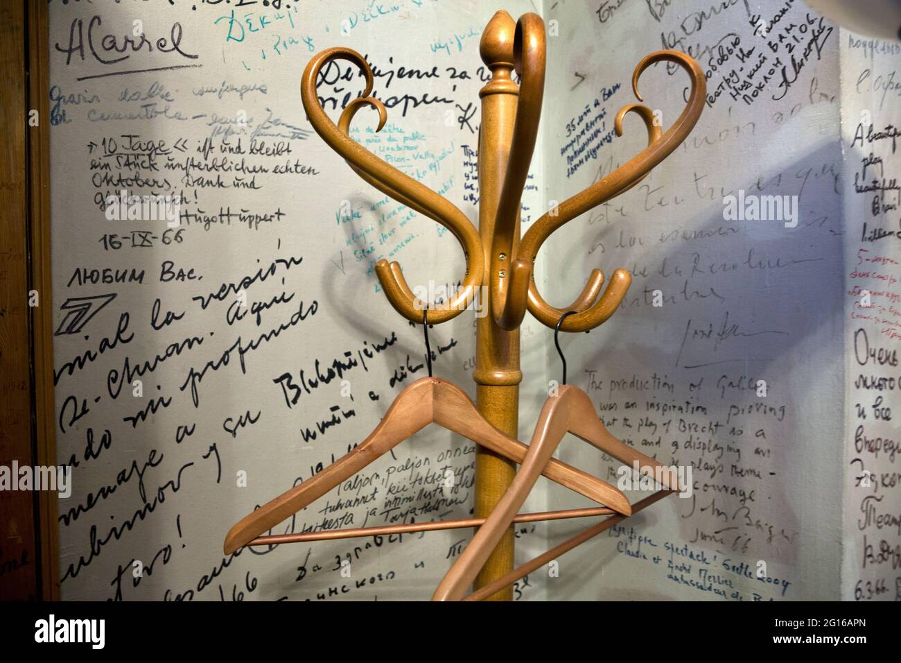 Moscow, Russia. 14th of February, 2014 An empty clothes hangers in the office of Yuri Petrovich Lyubimov against the background of inscriptions with wishes from famous people in the Taganka Theater in Moscow Stock Photo