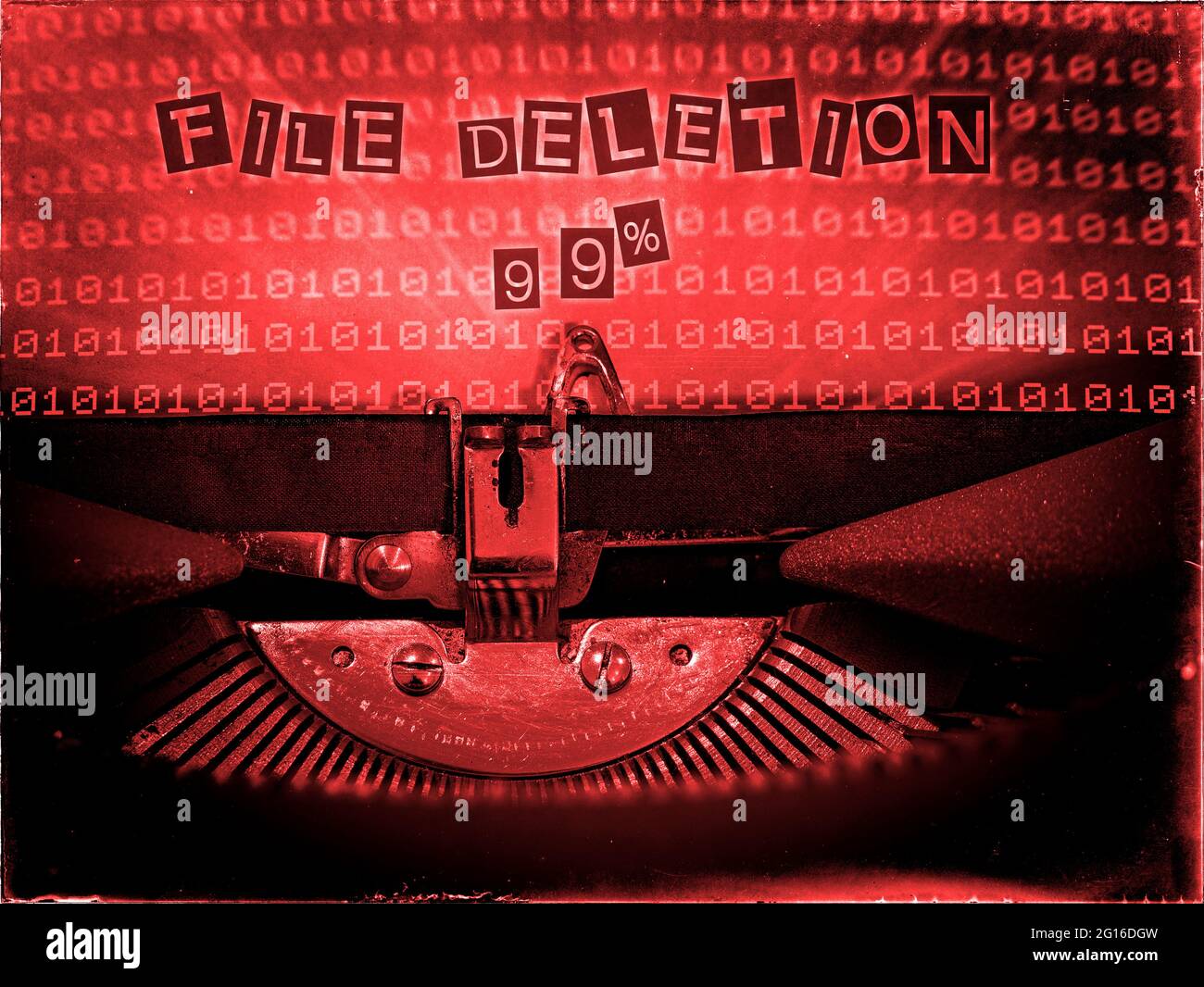 File Deletion 99%, Mechanical Typewriter, Binary code background, Red tone, Vintage distorted look, Ransom note typography Stock Photo