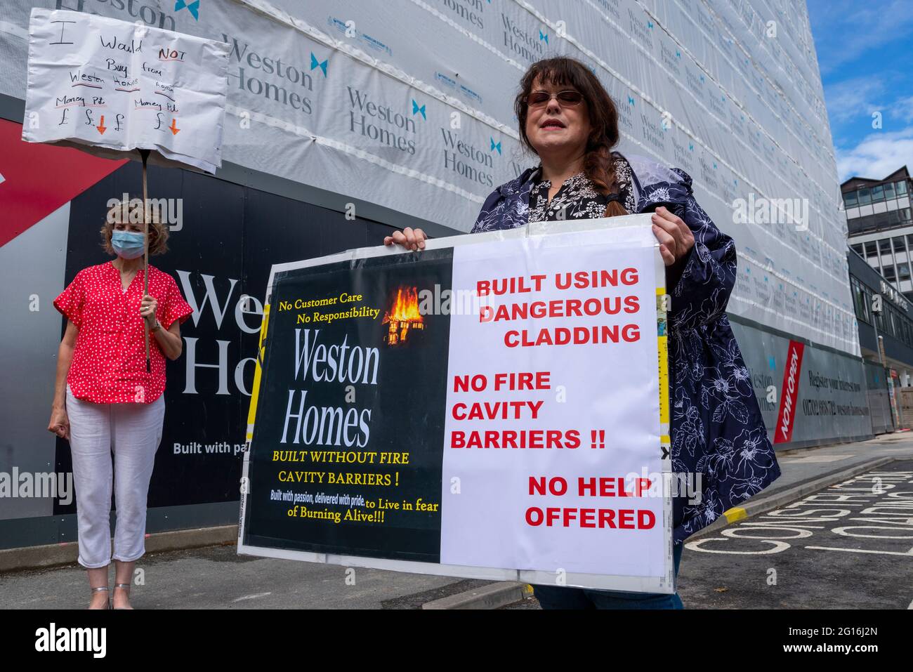 Southend on Sea, Essex, UK. 5th Jun, 2021. A National Day of Developer Protest is taking place outside a Weston Homes show home site by protesters who believe that such developers should be responsible for correcting high rise fire safety issues in the buildings in which they live. The Grenfell Inquiry has resulted in £5bn being made available by government for the replacement of cladding, but it has been estimated that a figure of £15bn would be required to correct all fire safety issues, a shortfall which has fallen onto residents to pay themselves Stock Photo