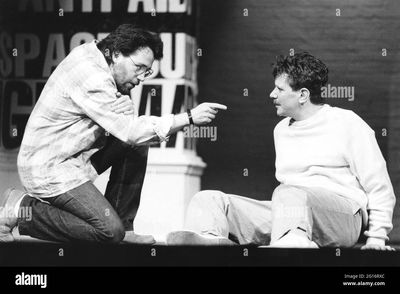 l-r: Tom Hulce (Ned Weeks), Paul Jesson (Felix Turner) in THE NORMAL HEART by Larry Kramer at the Albery Theatre, London WC2  20/05/1986  a Royal Court Theatre production  design: Geoff Rose  lighting: Gerry Jenkinson  director: David Hayman Stock Photo