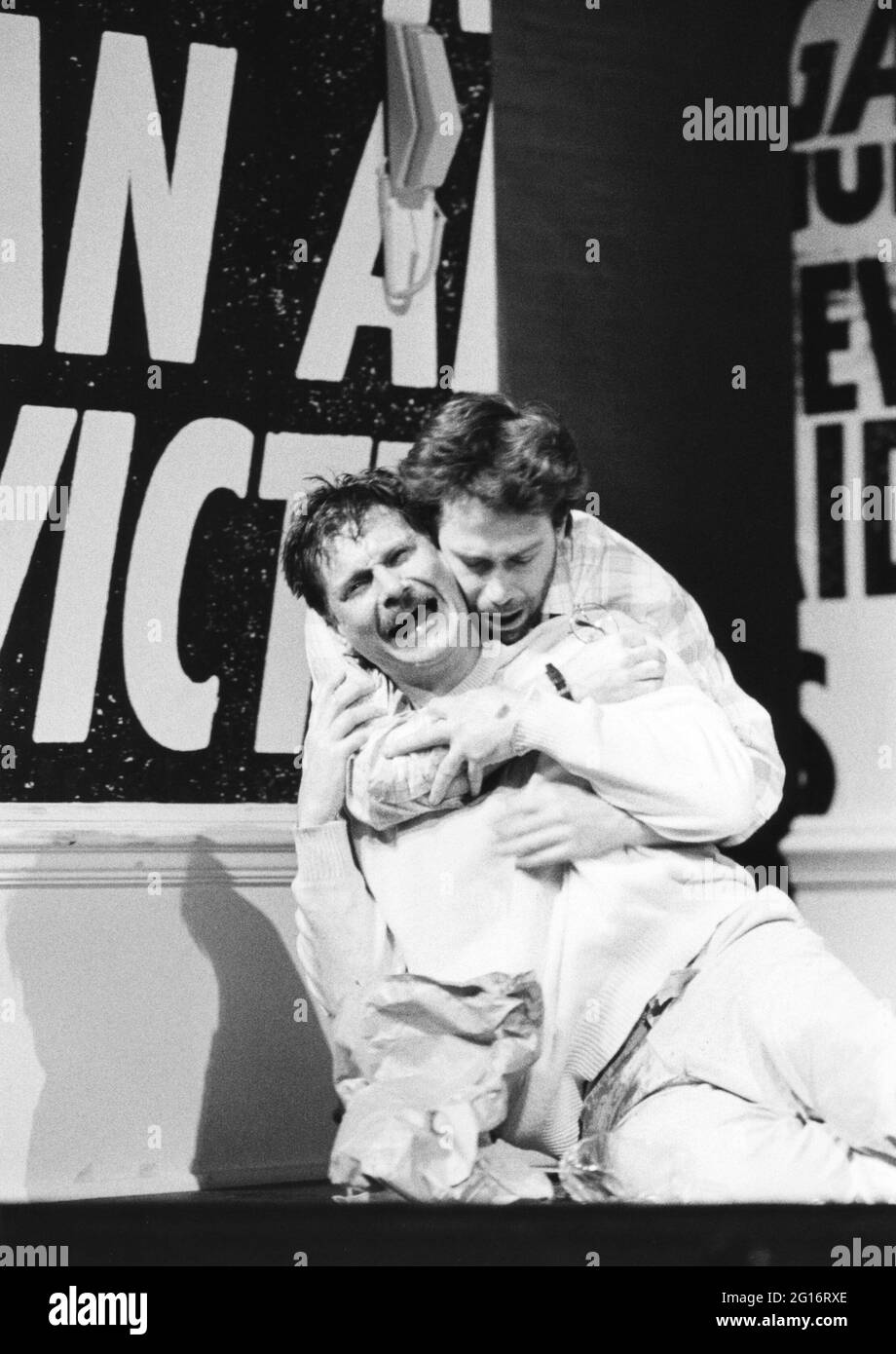 l-r: Paul Jesson (Felix Turner), Tom Hulce (Ned Weeks) in THE NORMAL HEART by Larry Kramer at the Albery Theatre, London WC2  20/05/1986  a Royal Court Theatre production  design: Geoff Rose  lighting: Gerry Jenkinson  director: David Hayman Stock Photo