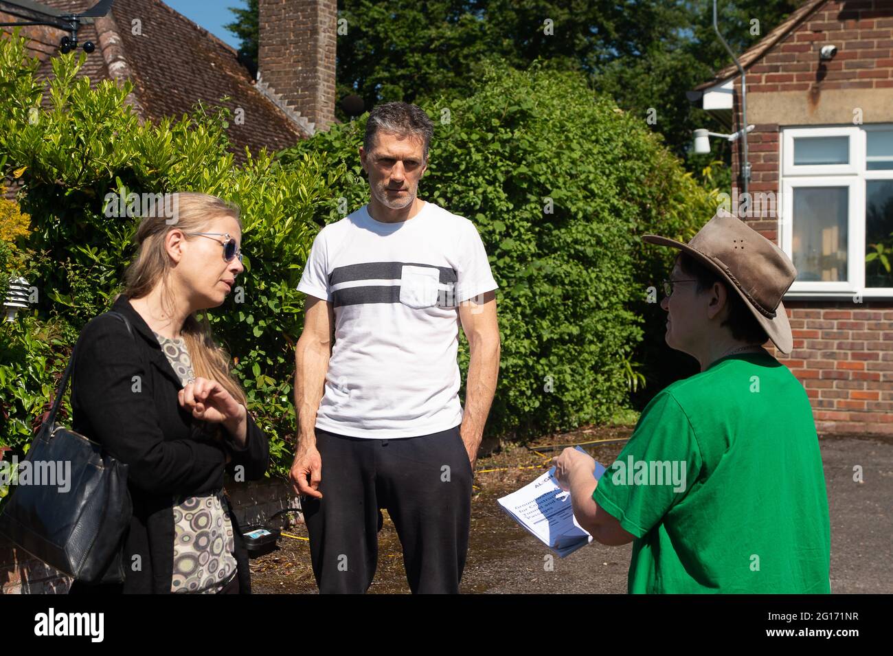 Chalfont St Giles, UK. 5th June, 2021. Sian Berry (left) the Co-Leader of the Green Party met local residents impacted by the High Speed Rail construction today. HS2 have built a steep and high sided haul road right outside residents homes in Bottom House Farm Lane, Chalfont St Giles.  The noise, disruption and impact is unbearable for some residents. Credit: Maureen McLean/Alamy Live News Stock Photo