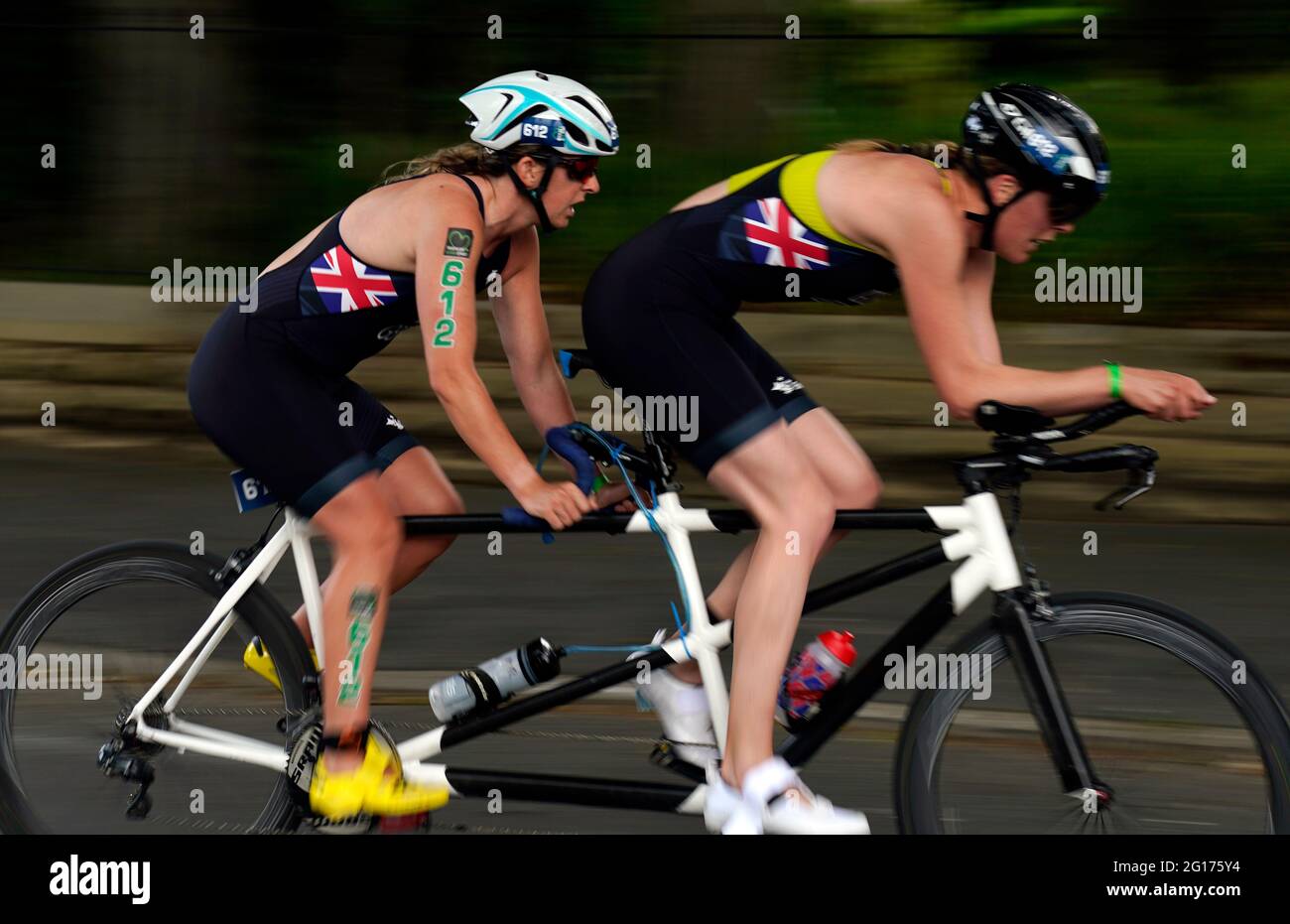 Melissa Reid (left)and guided during the cycling stage of the AJ Bell 2021 World Triathlon Para Series race in Roundhay Park, Leeds. Picture date: Saturday June 5, 2021. Stock Photo