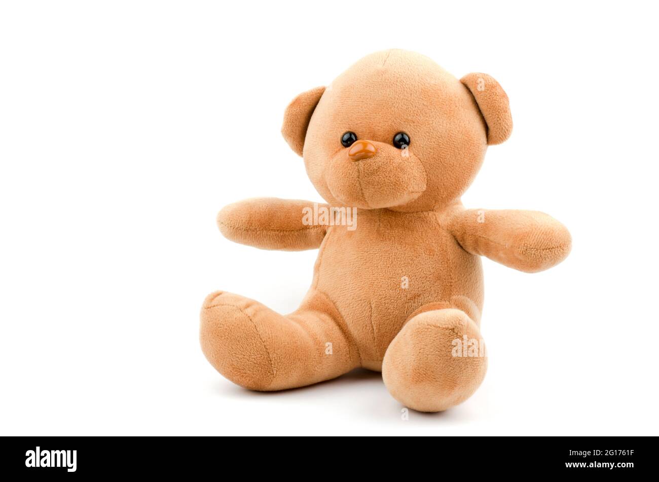Brown teddy bear on a white background, isolate. Children's soft toy Stock Photo