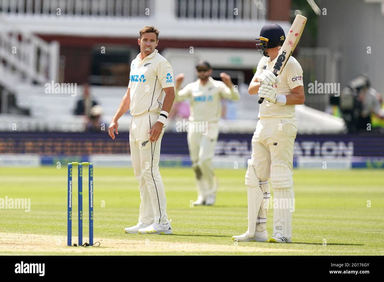 New Zealand's Tim Southee (left) and England's Ollie Robinson during day four of the first LV= Insurance Test match at Lord's, London. Picture date: Saturday June 5, 2021. Stock Photo