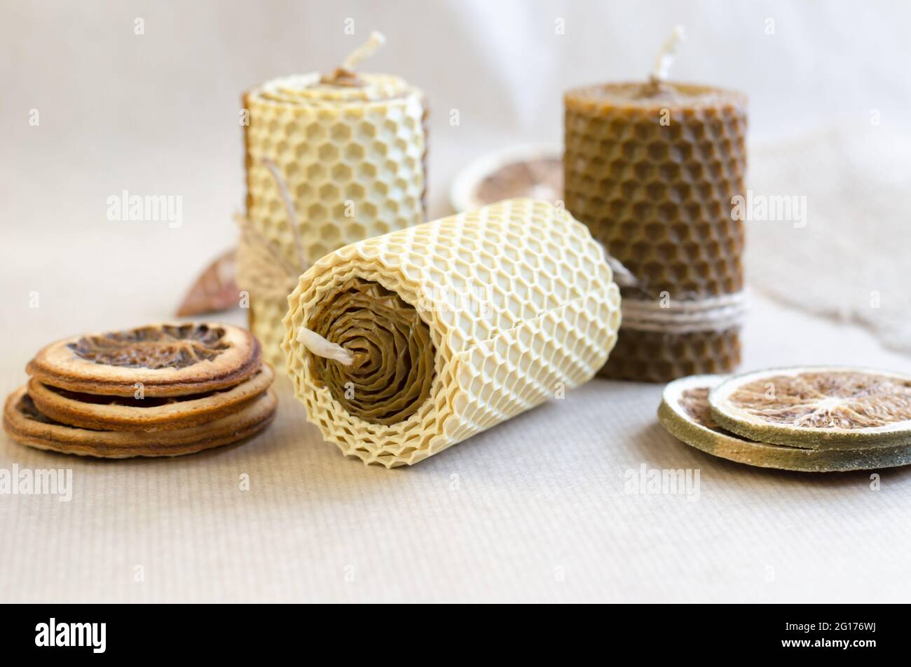 Decorations for the interior. Handmade decorative wax candles with honey aroma. Stock Photo