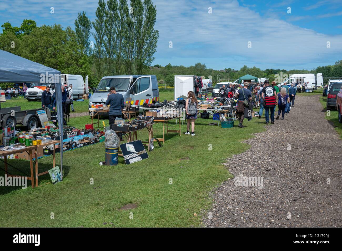 A row of stall sellers at a classic car show selling car parts Stock