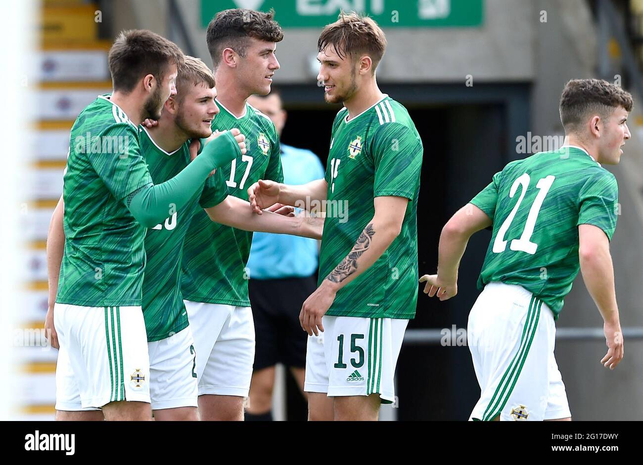 Northern Ireland's Ryan Waide (left) celebrates scoring their side's second goal of the game with team-mates during the International Friendly at C&G Systems Stadium, Dumbarton. Picture date: Saturday June 5, 2021. Stock Photo