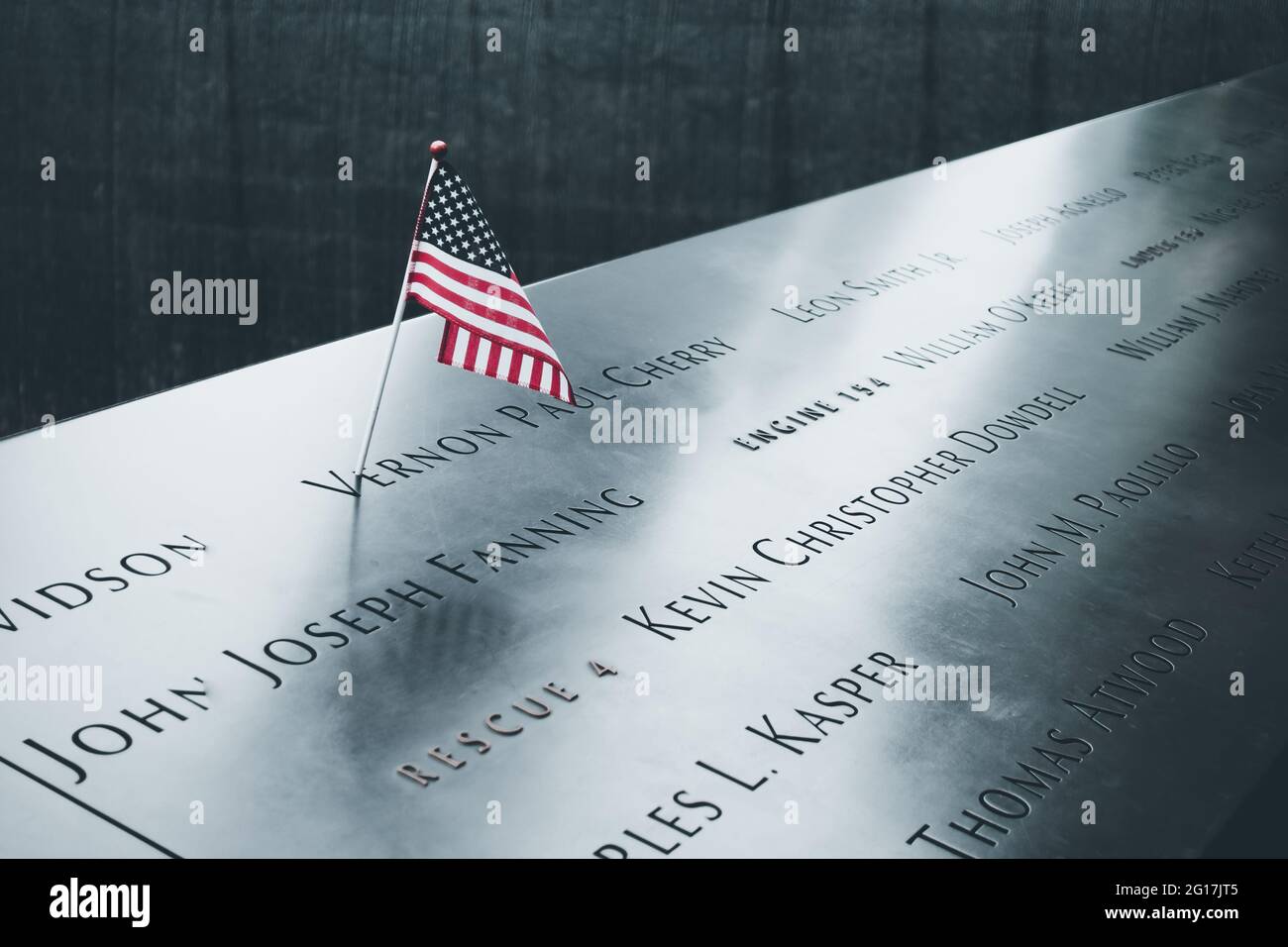 The American flag on the 911 Memorial in Manhattan, New York City, United States Stock Photo