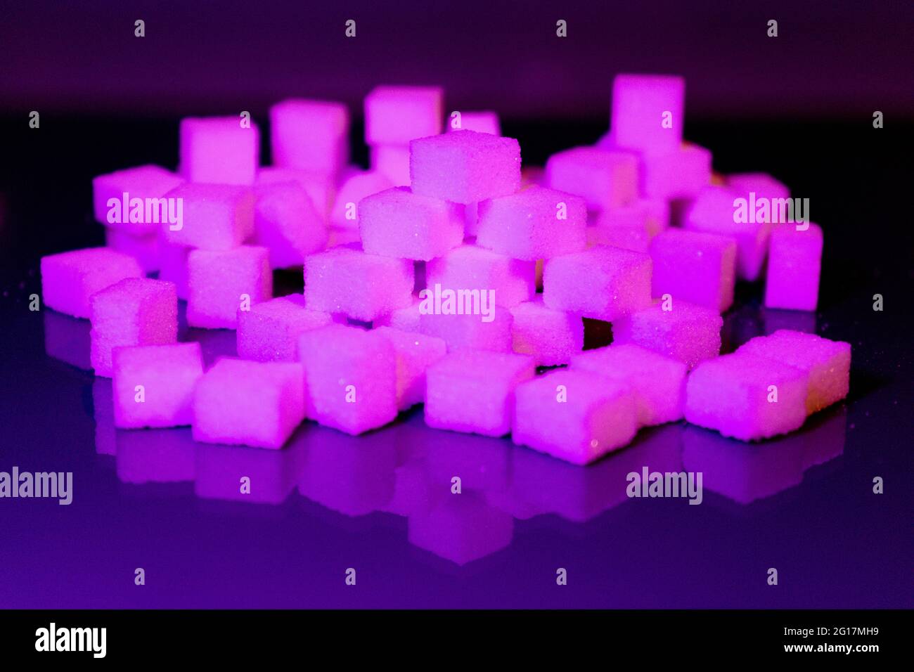 Sugar cubes in different arrangements and colored light. Arrows, Cubes