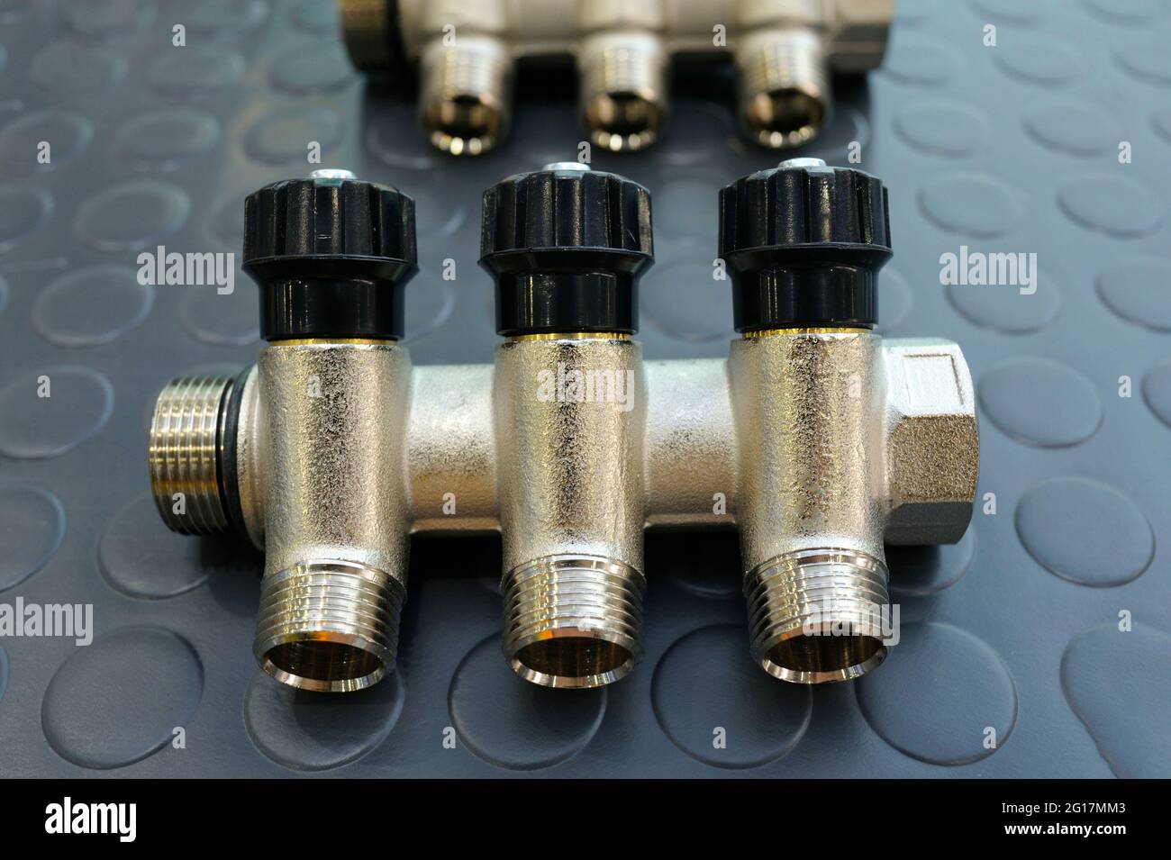 Fitting for a boiler placed on a counter. Plumbing equipment Stock