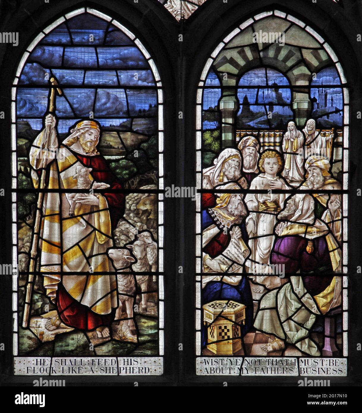 Stained glass window depicting Jesus the Good Shepherd and talking to the men in the temple, Lady St Mary  Church, Wareham, Dorset Stock Photo