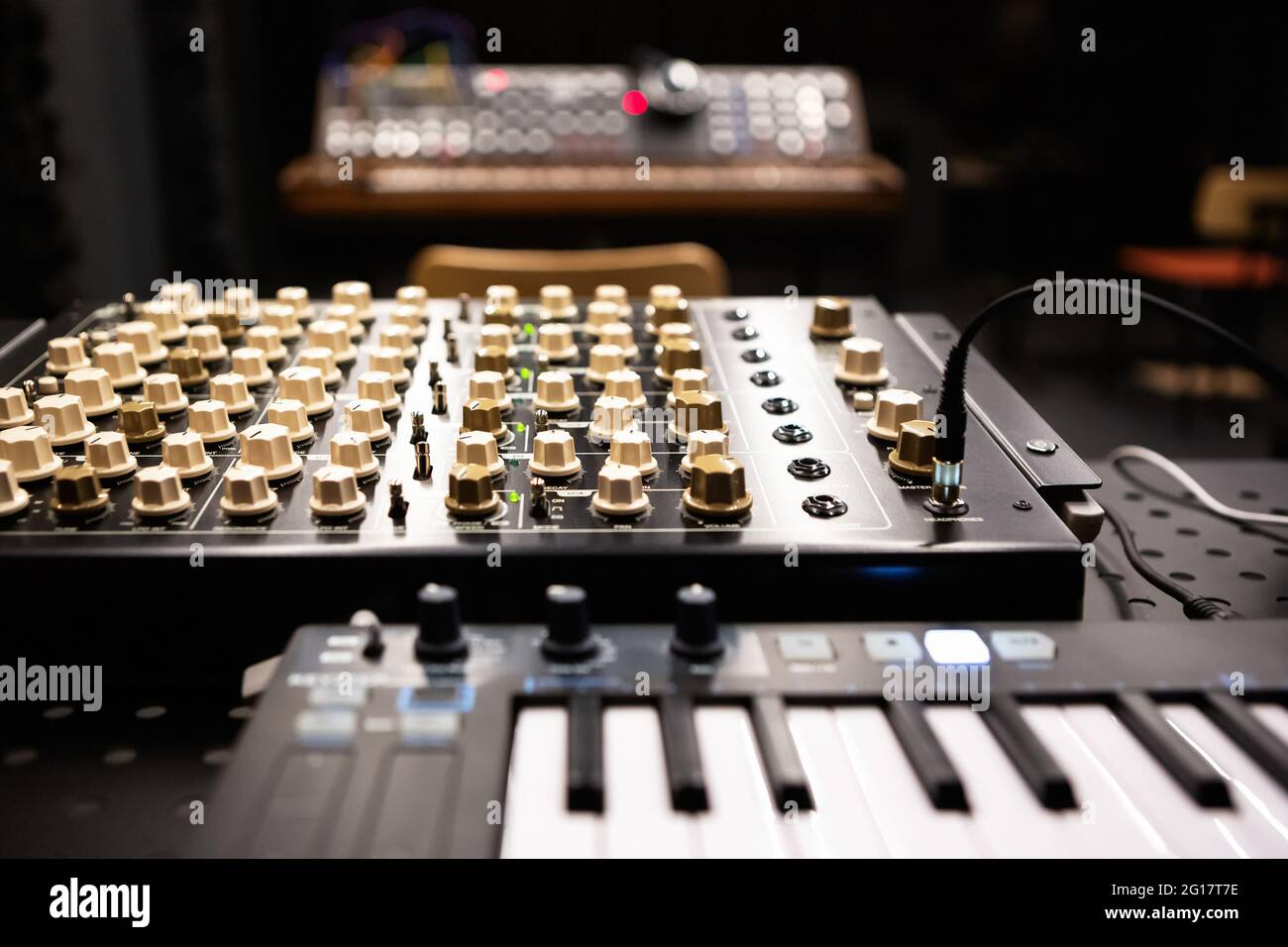Sound mixer and synthesizer piano in sound recording studio