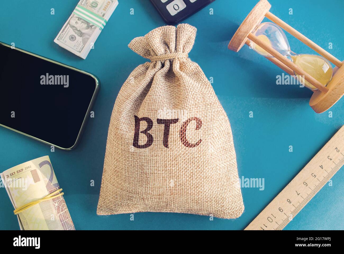 BTC money bag. Cryptocurrency concept. Decentralized digital currency.  Blockchain. The rise and fall of bitcoin. Technologies. Money, hourglass  and ph Stock Photo - Alamy