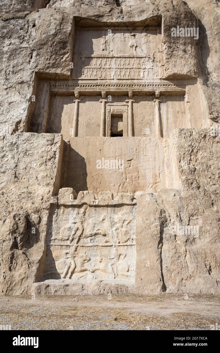 Naqsh-e Rostam,necropolis of the Achaemenid dynasty near Persepolis, with tomb of Darius I,cut high into the cliff face. Iran. Stock Photo