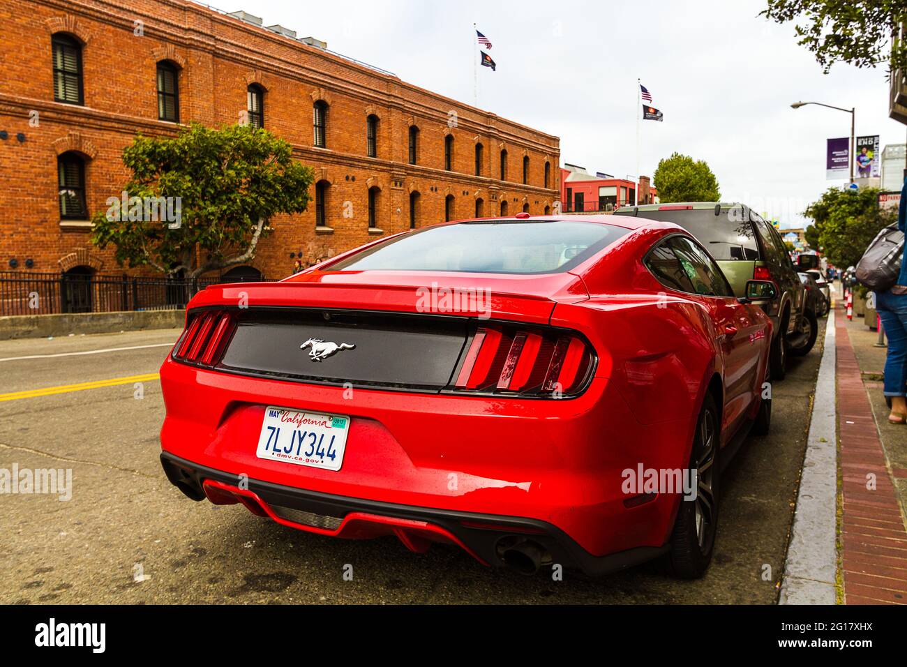 Sixth generation red Ford Mustang parked at Fisherman's Wharf in San Francisco Stock Photo