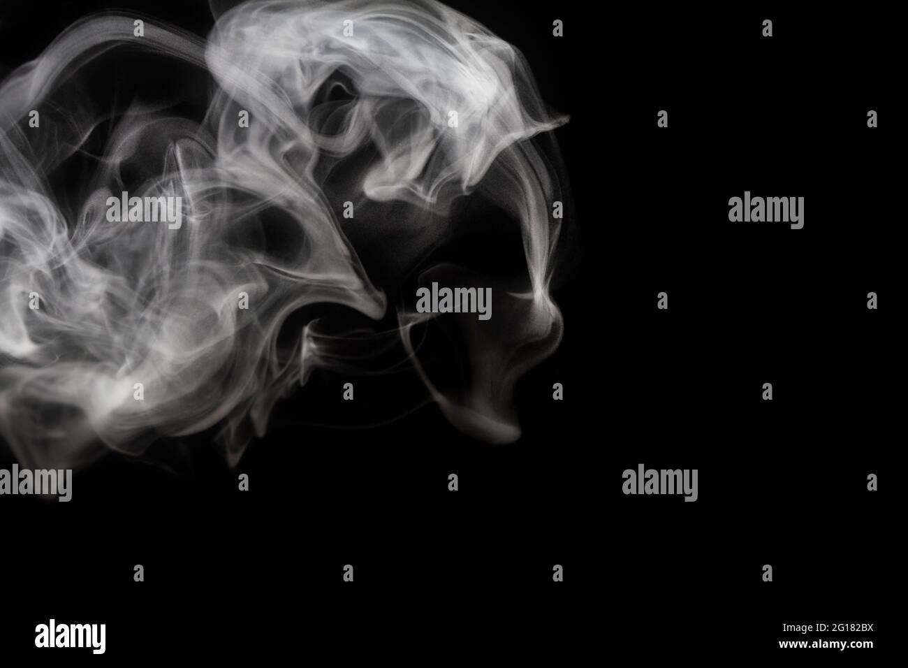 White smoke on black background Stock Photo