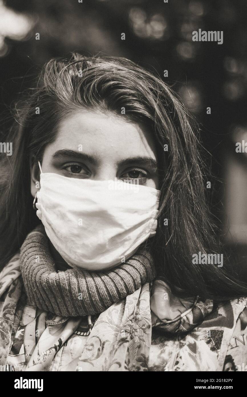 young girl in a mask from covid-19 Stock Photo - Alamy