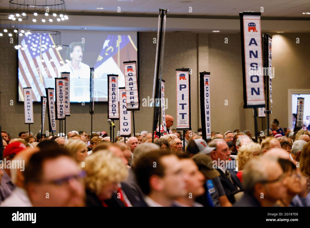 Delegates representing various state counties attend the North Carolina