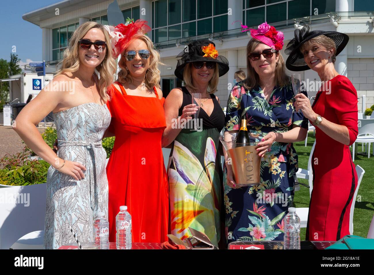 Epsom, UK. 5th June, 2021. A crowd of 4,000 people at Epsom racecourse for  the 2021 Epsom Derby run over a distance of one mile, four furlongs and 6  yards. Derby day