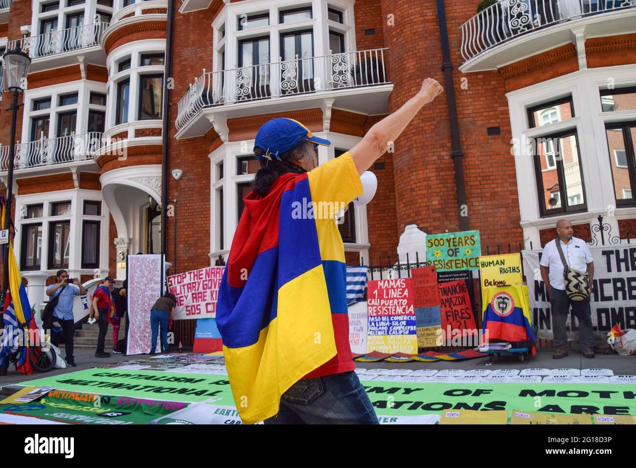 London, UK. 05th June, 2021. A protester with a megaphone gestures outside the Colombian Embassy in London during the demonstration.A demonstration was held outside the embassy in Knightsbridge as part of the ongoing protests against the current Colombian government. Credit: SOPA Images Limited/Alamy Live News Stock Photo