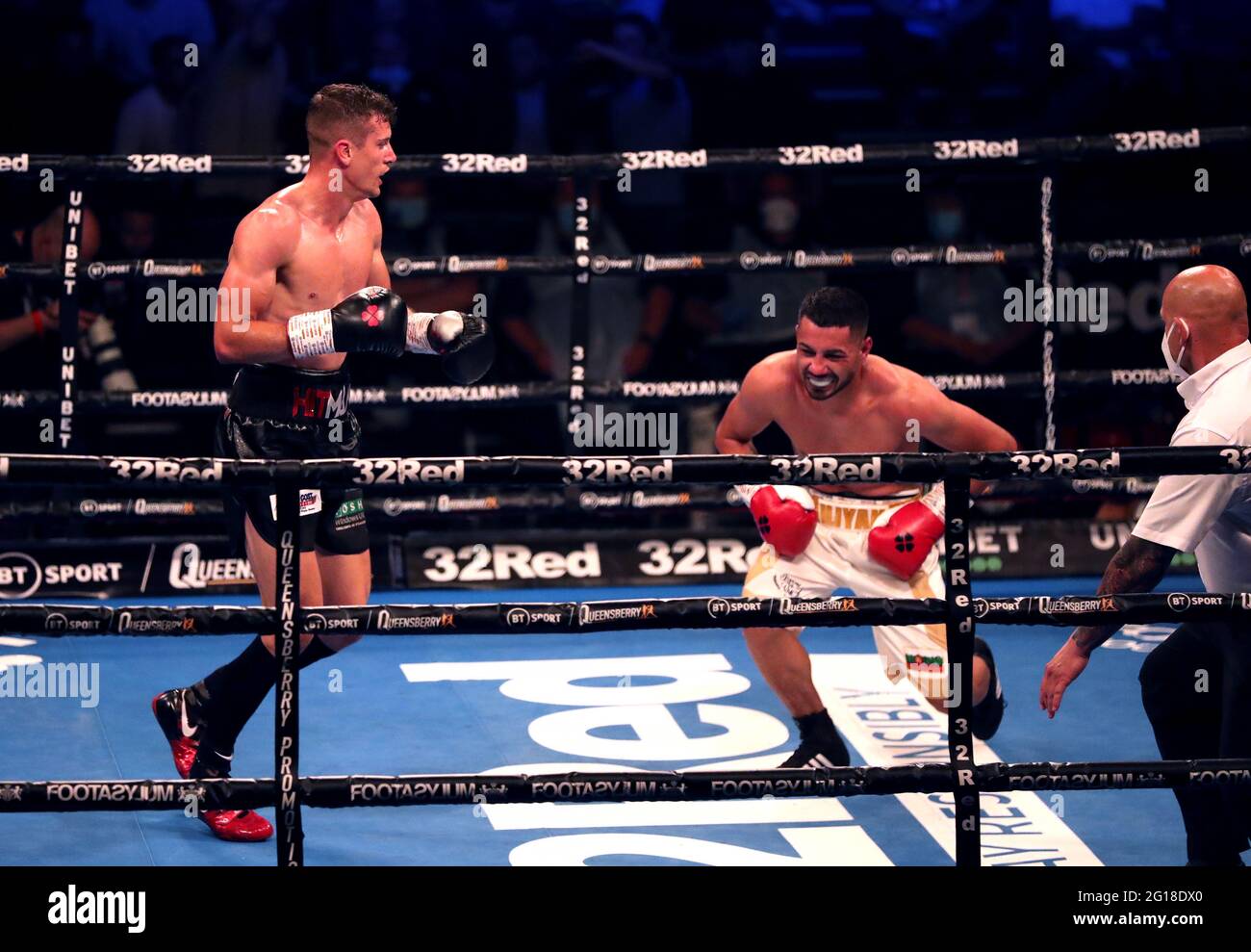 Nathan Heaney (left) knocks down Iliyan Markov in the International Middleweight Contest during the Boxing event at the Telford International Centre, Telford. Picture date: Saturday June 5, 2021. Stock Photo