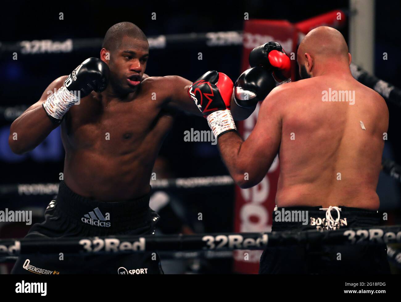 Daniel Dubois (left) and Bogdan Dinu in the WBA Interim Heavyweight Championship during the Boxing event at the Telford International Centre, Telford. Picture date: Saturday June 5, 2021. Stock Photo