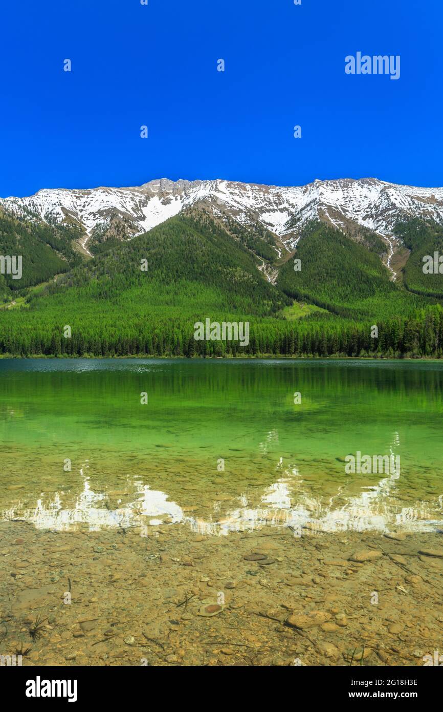 clearwater lake below the swan range in lolo national forest near condon, montana Stock Photo
