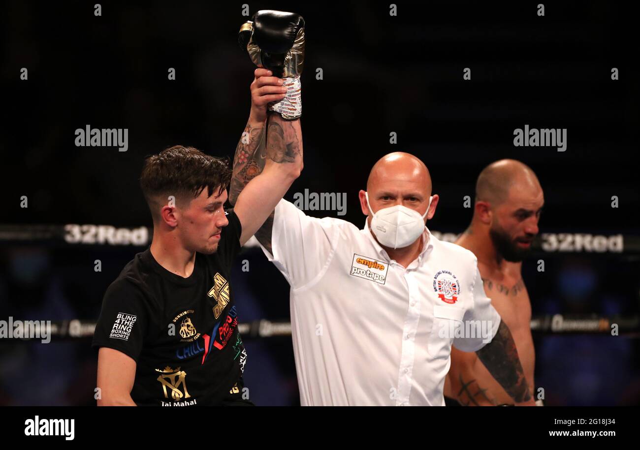 Liam Davies (left) celebrates victory in the Bantamweight contest during the Boxing event at the Telford International Centre, Telford. Picture date: Saturday June 5, 2021. Stock Photo