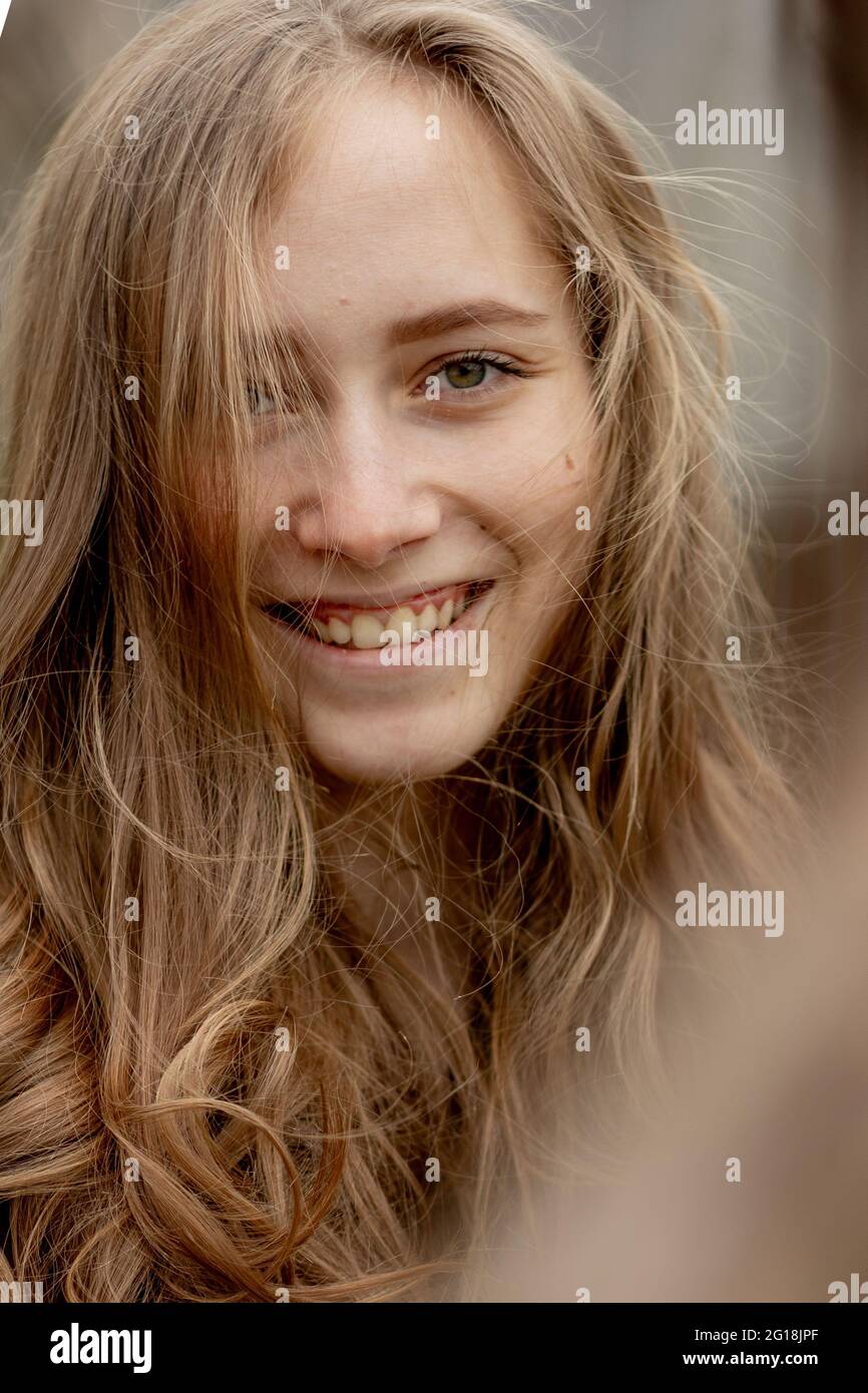 Portrait of young beautiful happy girl in outdoors Stock Photo - Alamy