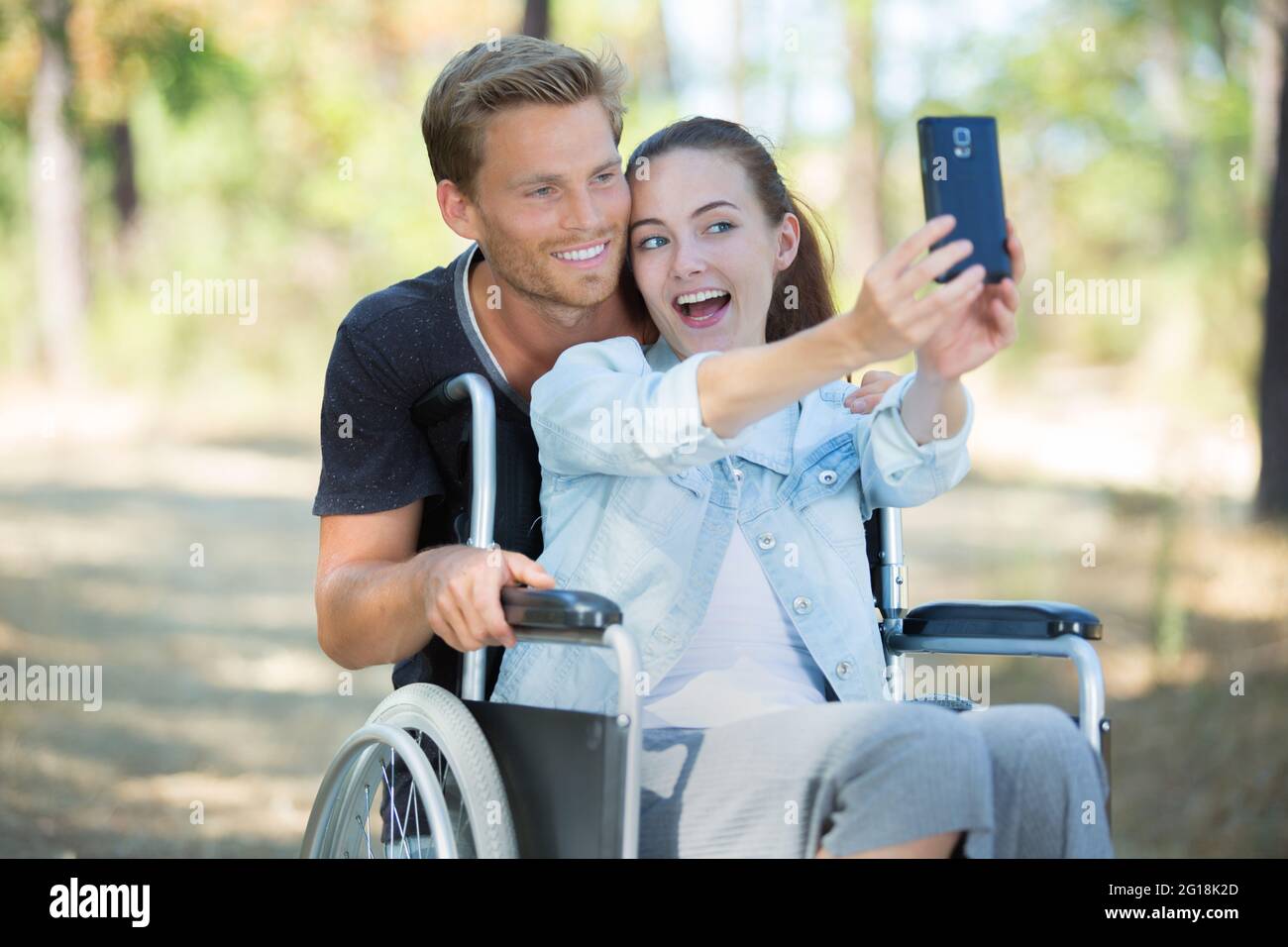 happy couple in love taking selfie in the park Stock Photo - Alamy