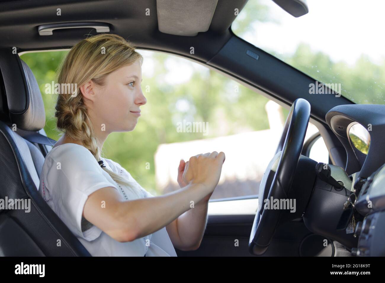 a beautiful woman in her car Stock Photo Alamy