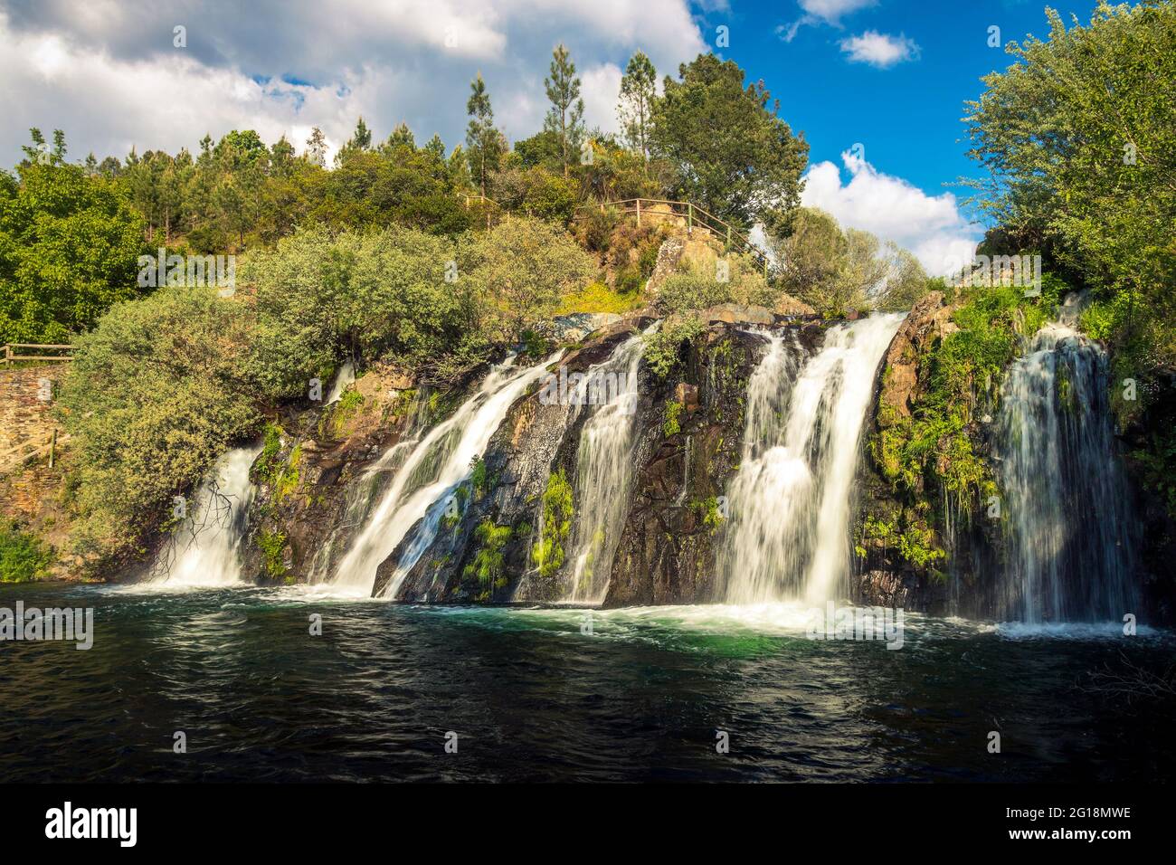 Spectacular waterfall of Poço da Broca in Barriosa, municipality of Seia in Portugal, in the Serra da Estrela Natural Park. Stock Photo