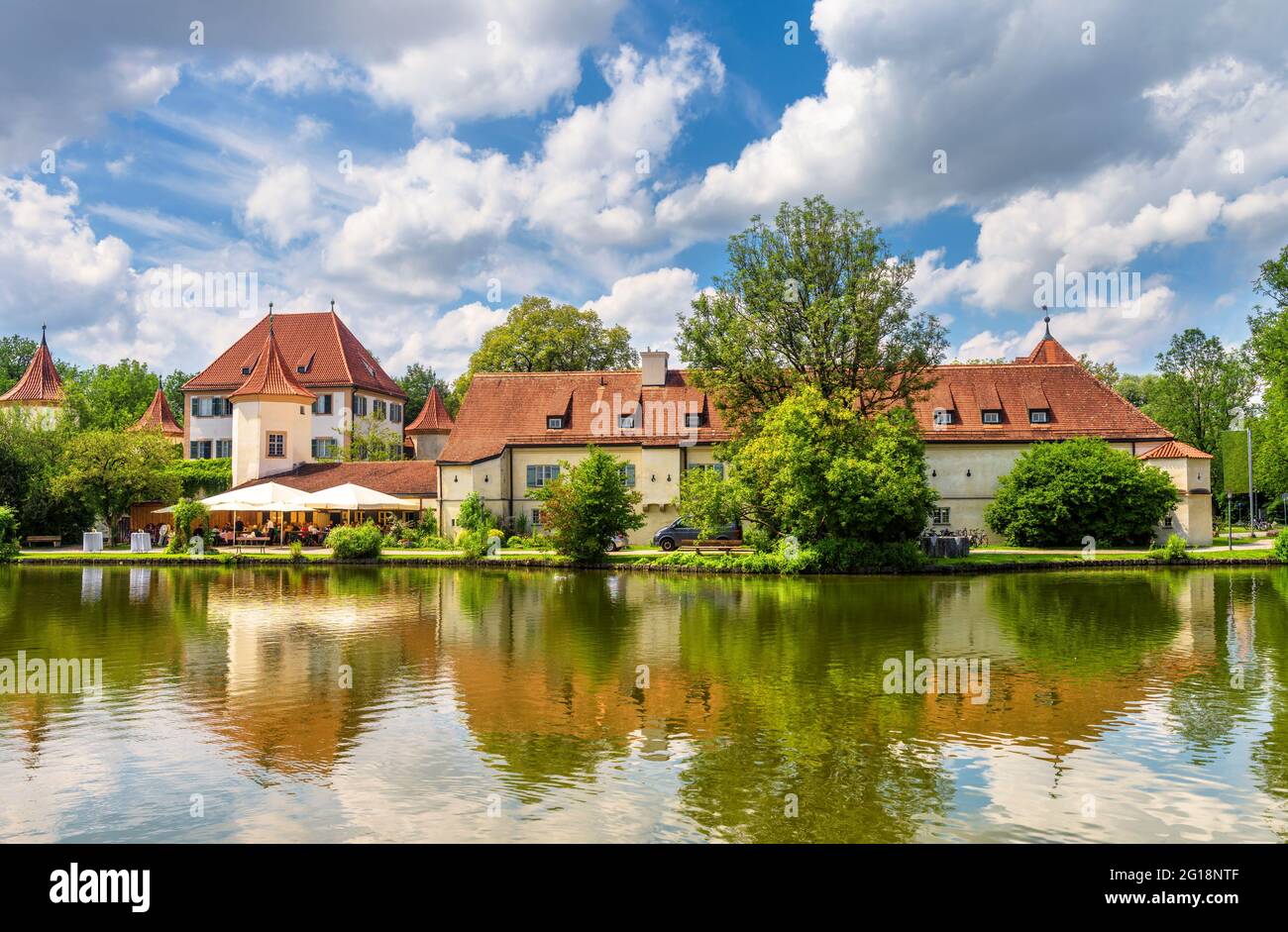 Blutenburg Castle in Munich, Germany. It is tourist attraction of Munich city. Landscape with medieval houses of Munich in summer. Beautiful panorama Stock Photo