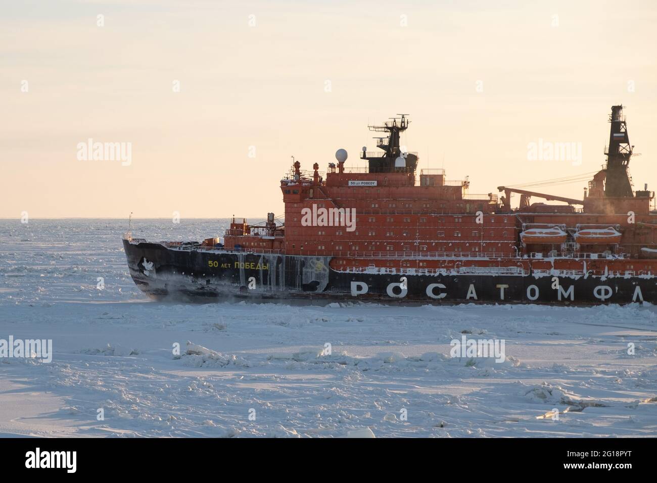 Sabetta, Tyumen region, Russia - March 22, 2021: The 50 let Pobedy icebreaker moves into ices. Stock Photo
