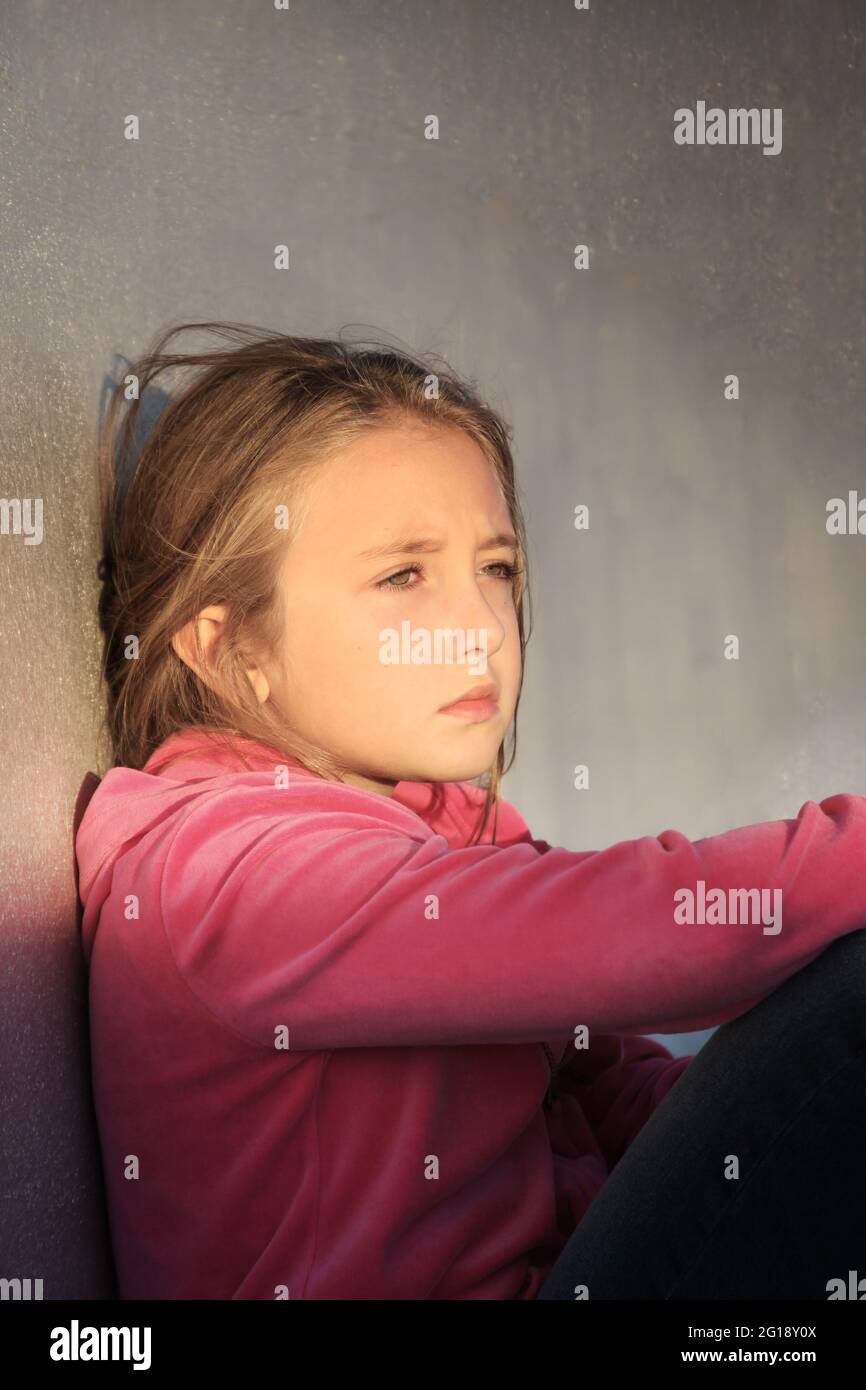 Serious / sad little girl Stock Photo