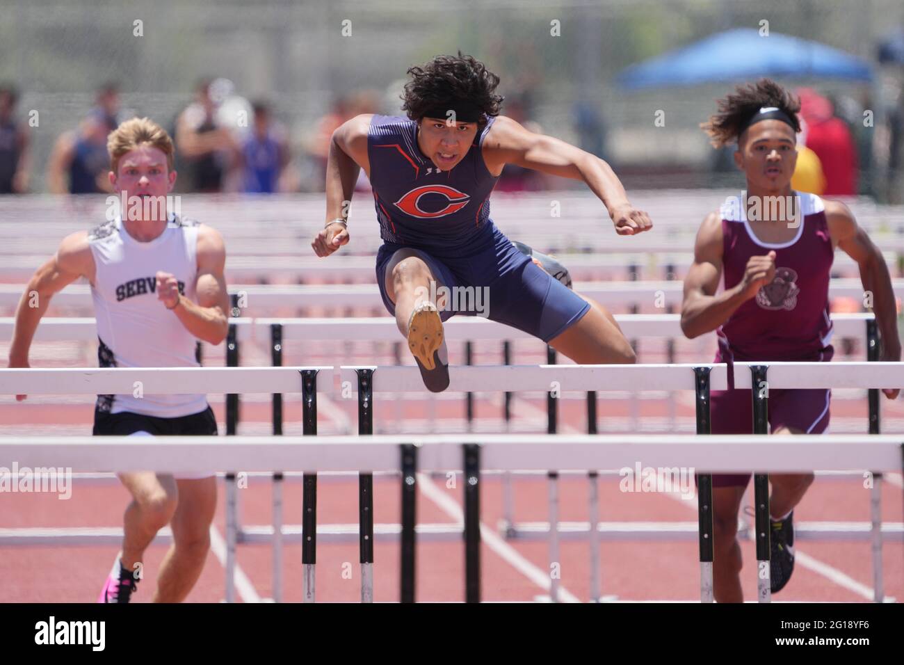 Xayvion Perkins of Chaminade wins 110m hurdles heat in a windaided 14.