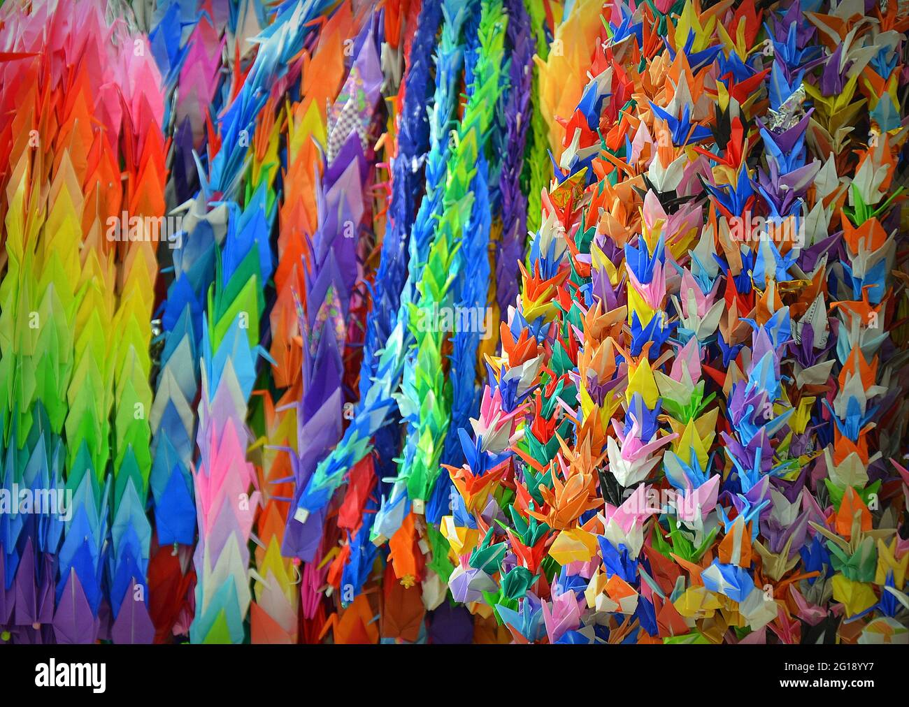 Hiroshima Peace Memorial Park. Paper cranes hanging outside of the Children's Peace Monument.They serve as a symbol of peace. Stock Photo