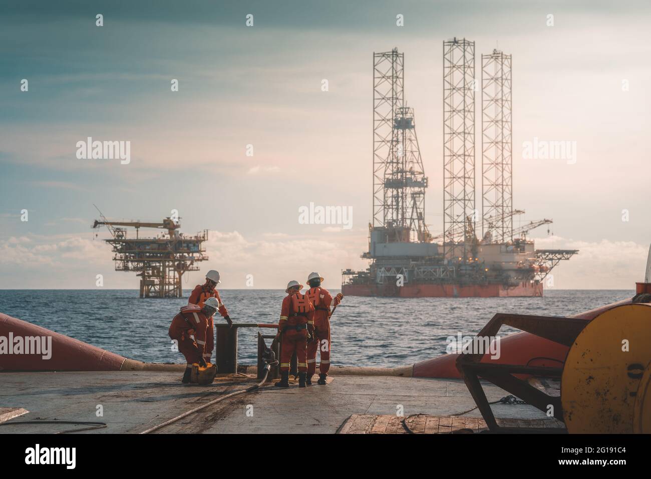 Offshore worker involvement in anchor handling operation Stock Photo