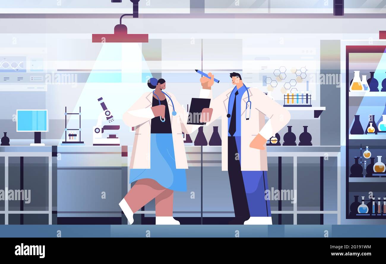 research scientist team working in lab researchers making chemical experiments in laboratory