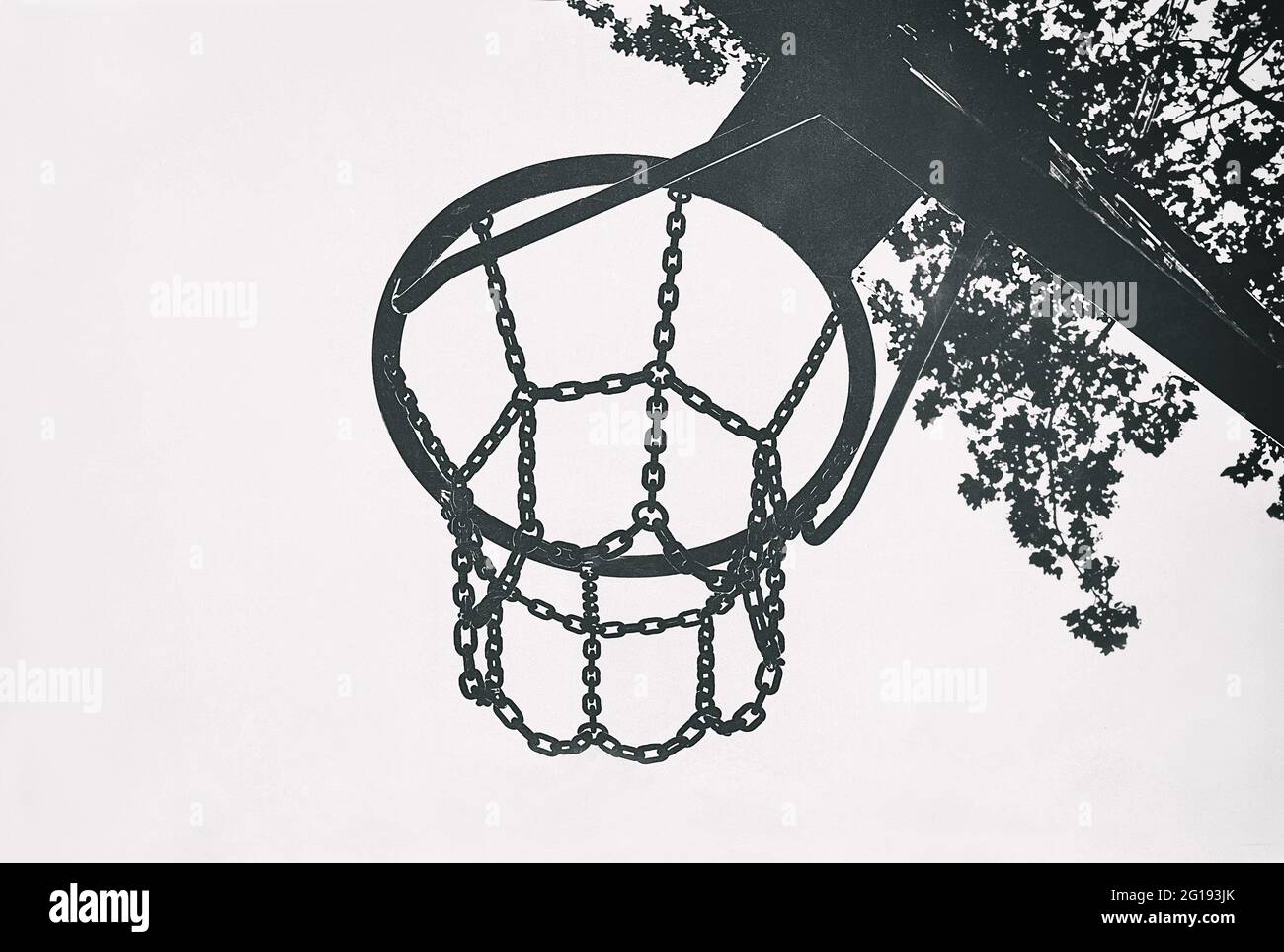 Basketball hoop silhouette in minimalist black and white monochrome style as dark pop art style with cool saturated colors. Stock Photo