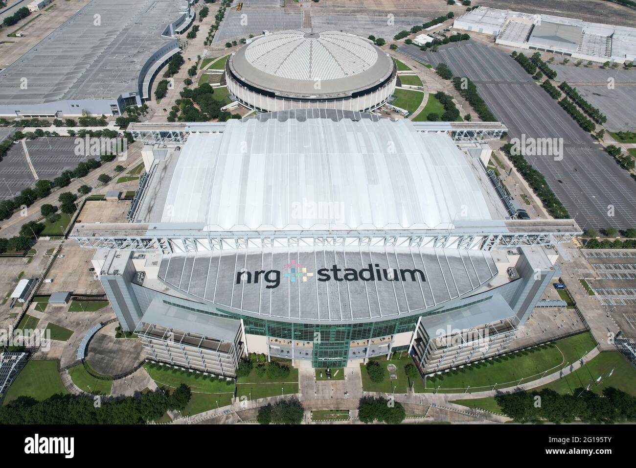 An aerial view of NRG Stadium and Astrodome, Sunday, May 30, 2021, in  Houston. NRG Stadium is the home of the Houston Texans. The Astrodome  served as the home of the Houston